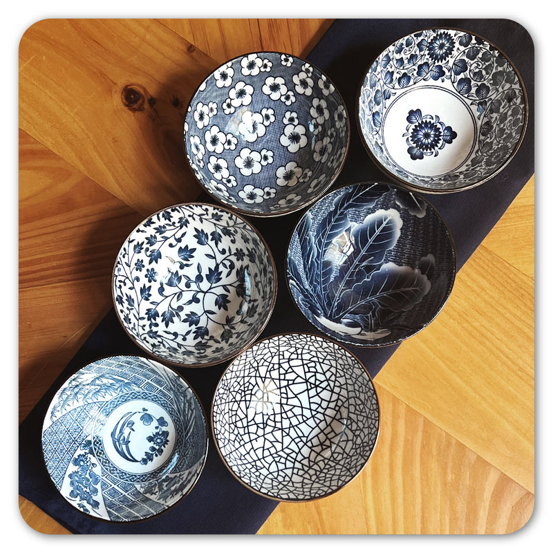 Blue and white japanese bowls and wood plates