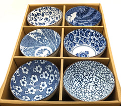 carton of six blue and white bowls