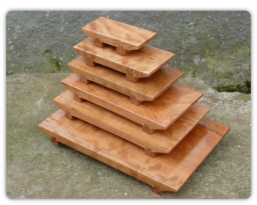 Handmade wooden sushi boards in a variety of sizes