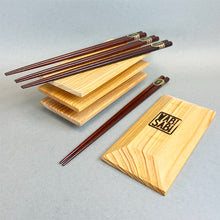 WabiSabi Hinoki Cypress mini plates with logo and wood chopsticks