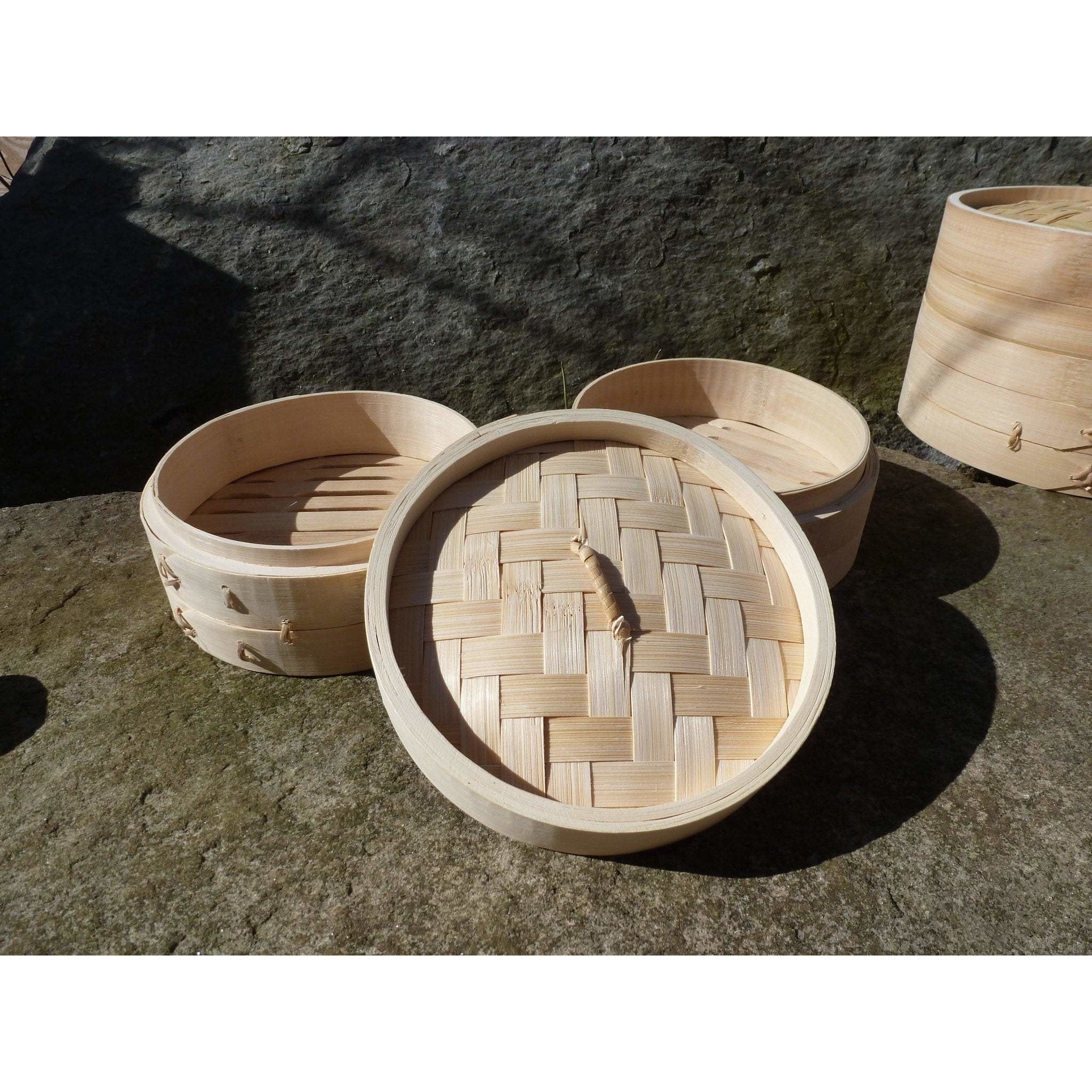 https://realwasabi.com/cdn/shop/products/bamboo-steamer-sets-are-available-in-multiple-sizes-stacked-table-ware-wood-tree_591.jpg?crop=center&height=2048&v=1584658348&width=2048